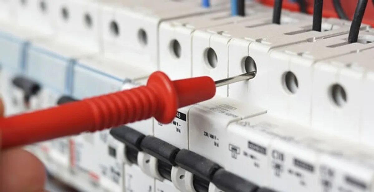 Electrical contractor testing circuit breakers during electrical repair in Marysville, PA