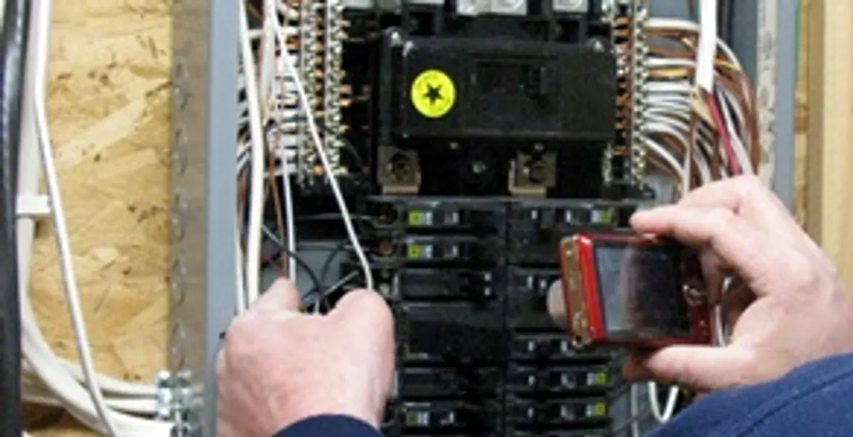Home electrical inspection of circuit breaker panel by licensed electrician in Harrisburg, PA