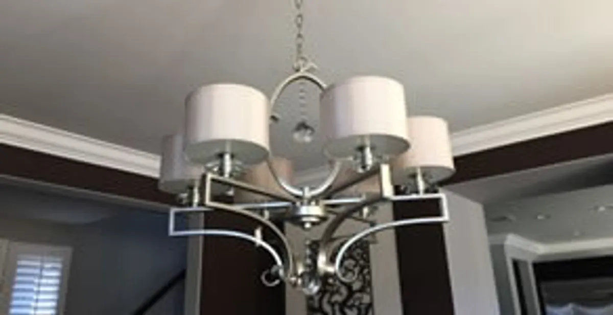 Modern chandelier installation with multiple light fixtures in Harrisburg, PA