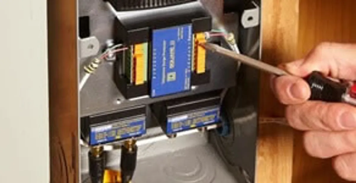Whole home surge protection device being installed by a licensed electrician to protect electrical systems in Harrisburg, PA